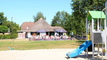 Playground at restaurant "De Huiskamer" at holiday park Molecaten het Landschap