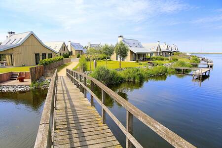 Bridge to luxury holiday villas at holiday park Oesterdam Resort in Zeeland