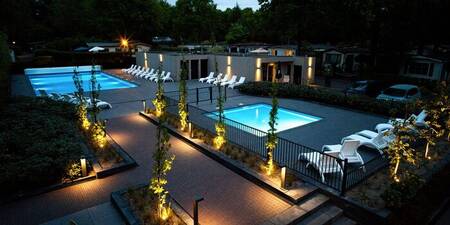 The heated outdoor swimming pool of holiday park Park Berkenrhode
