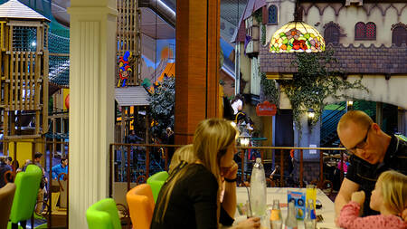 Family in the largest indoor playground in the Benelux "Kids Valley" of holiday park Park Molenheide