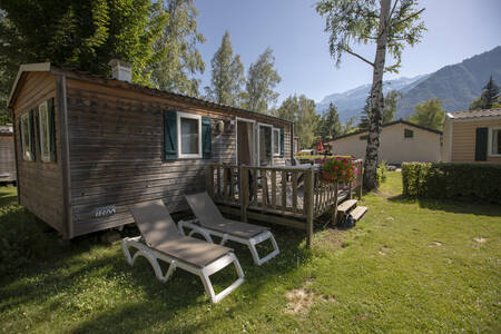 Sun loungers in the garden of a mobile home at the RCN Belledonne holiday park