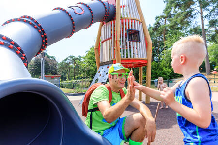 Child in the playground at holiday park RCN De Noordster