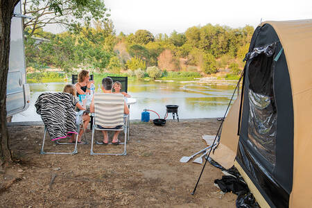 Camping pitch on the river Ardèche at holiday park RCN La Bastide en Ardèche