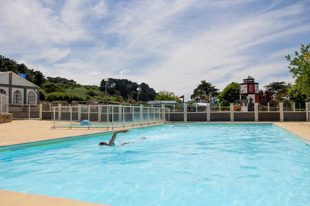 Man swimming in the outdoor pool of holiday park RCN Port l'Epine