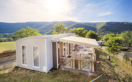 A mobile home with veranda at holiday park RCN Val de Cantobre