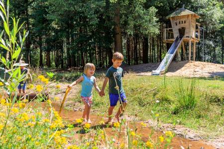 Children in a playground at holiday park RCN de Flaasbloem