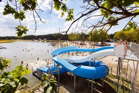 Large water slides on the recreational lake at holiday park RCN de Flaasbloem