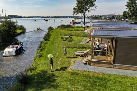 Mobil Homes of the type "de Klipper" on the water at holiday park RCN de Potten