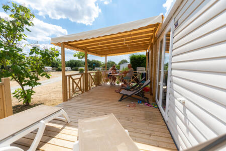 Chalet with covered veranda on holiday park RCN la Ferme du Latois