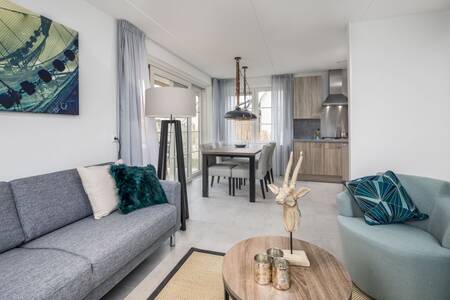 Living room and kitchen of a chalet at the Roompot Beach Resort Nieuwvliet-Bad holiday park