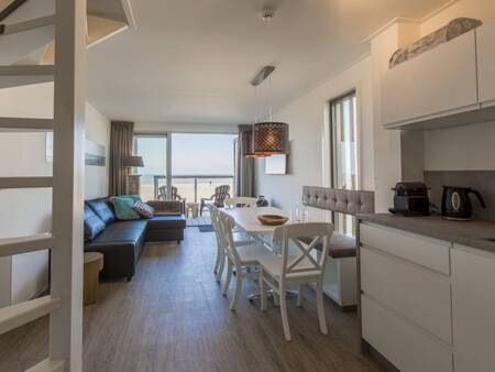 Living room and kitchen of a beach house at Roompot Beach Villas Hoek van Holland