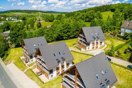 Aerial view of the apartment complexes at Roompot Bergresort Winterberg