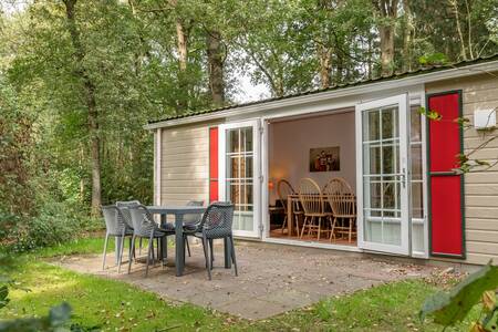 Garden furniture at a chalet at the Roompot Bospark Lunsbergen holiday park