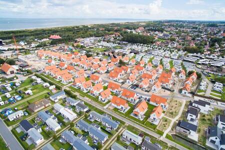 Aerial view of the Roompot Breeduyn Village holiday park and the North Sea