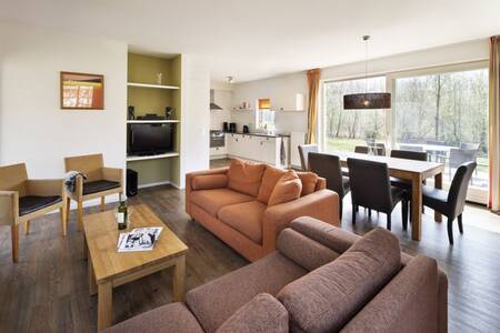 Spacious living room of a holiday home at holiday park Roompot Buitenplaats De Marke van Ruinen