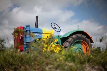 Tractor that children can play on in the playground of the Roompot Callantsoog holiday park