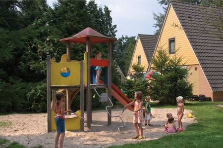 Children play in a playground at the Roompot De Katjeskelder holiday park