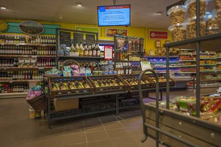 Shelves with groceries in the supermarket of the Roompot De Katjeskelder holiday park