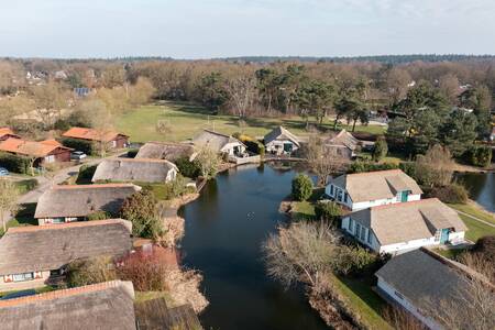 Aerial photo of holiday homes on the water at the Roompot De Veluwse Hoevegaerde holiday park