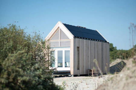 A detached ECO Cottage with solar panels at the Roompot ECO Grevelingenstrand holiday park