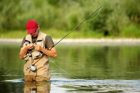 Man fishing - Roompot Ferienresort Cochem