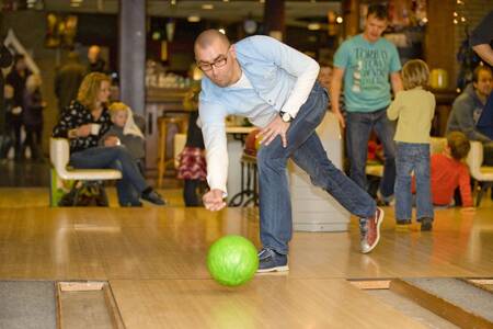 People bowling at the bowling alley of the Roompot Hof Domburg holiday park