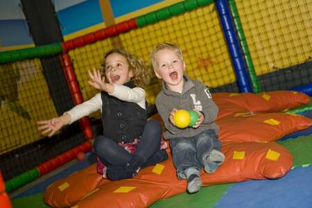 Children play in the indoor playground at the Roompot Hof Domburg holiday park