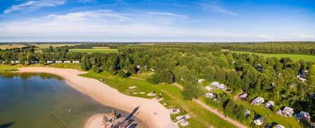 Aerial view of the recreational lake and holiday homes at Roompot Holiday Park Hunzedal