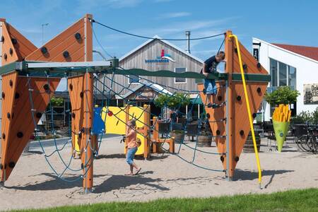 Children play in the playground of Roompot Holiday Park Boomhiemke