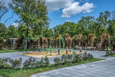 Children playing in the water playground of Roompot Holiday Park Schaijk