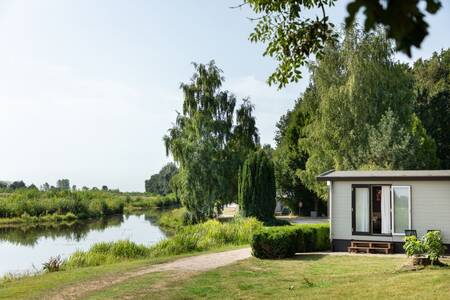 A chalet on the water at the Roompot Hunzepark holiday park