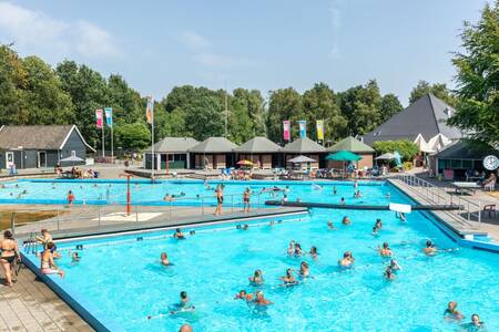 People in the outdoor pool at the Roompot Hunzepark holiday park