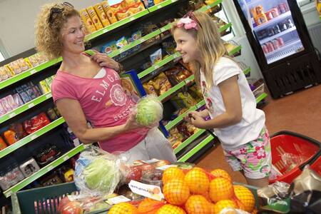 People shopping in the supermarket at Holiday Park Roompot Kustpark Egmond aan Zee