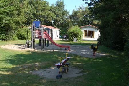 Playground for chalets at the Roompot Kustpark Texel holiday park