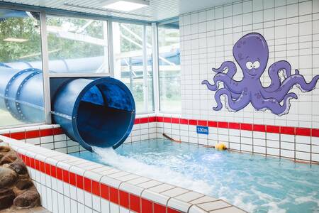 Large slide in the indoor pool of the Roompot Kustpark Texel holiday park