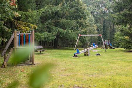 Playground equipment in a playground at the Roompot Landgoed Het Grote Zand holiday park