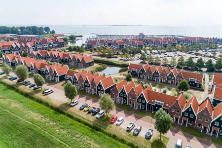 Aerial photo of holiday homes at the Roompot Marinapark Volendam holiday park with the Markermeer