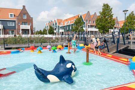 Children play in the water playground at the Roompot Marinapark Volendam holiday park