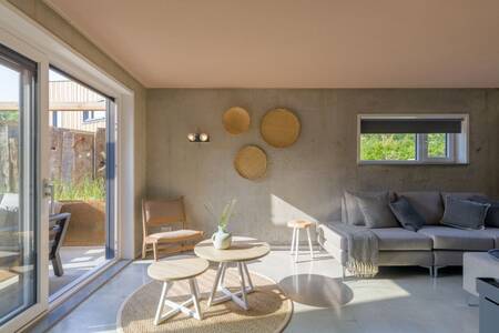 Large glass sliding doors in a luxury villa at the Roompot North Sea Resort Vlissingen holiday park