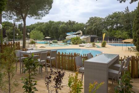 Terrace by the swimming pool of the Roompot Plein Air des Chênes holiday park