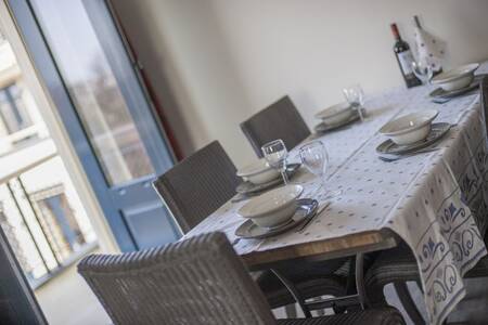 Set table in an apartment at Roompot Résidence Wijngaerde