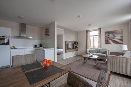 Kitchen and living room of an apartment at Roompot Résidence Wijngaerde