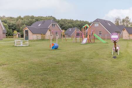 A playground between holiday homes on the small-scale Roompot Villaparc Schoonhovenseland