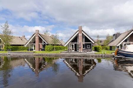 Detached holiday homes on the water at the Roompot Waterpark Terkaple holiday park