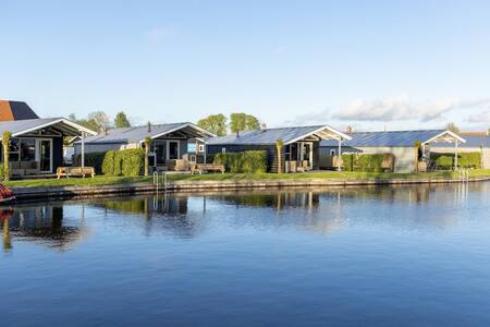 Holiday homes with a veranda on the water at the Roompot Waterpark Terkaple holiday park