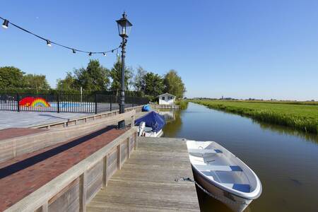 Boats at a jetty at the Topparken Park Westerkogge holiday park