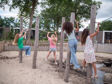 Children climb in a playground at the Topparken Résidence De Leuvert holiday park