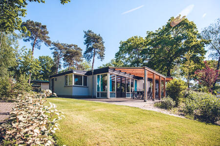 A bungalow for 12 people with a garden at holiday park Ackersate