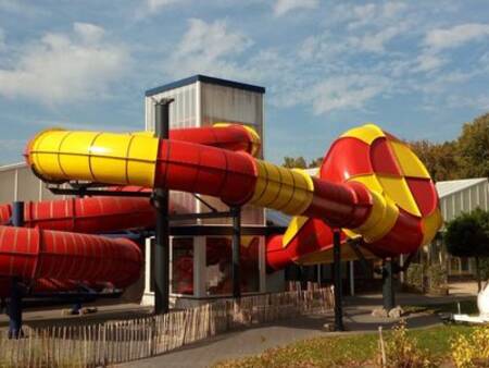 Large slide of the indoor swimming pool of holiday park Ackersate