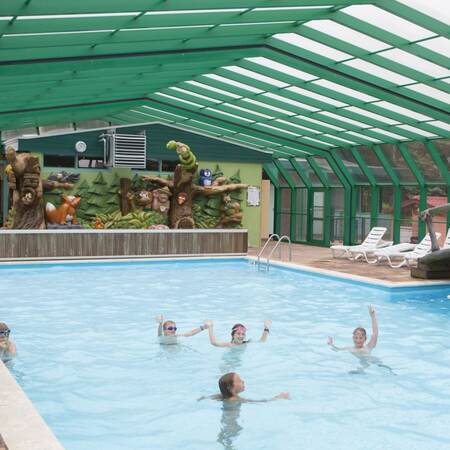 Swimming pool with sliding roof at Veluwecamping De Pampel
